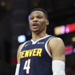 russell-westbrook-reacts-to-a-fan-during-a-game-between-the-denver-nuggets-and-houston-rockets